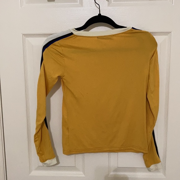 A mustard long sleeve with strips down the sides - Picture 2 of 3